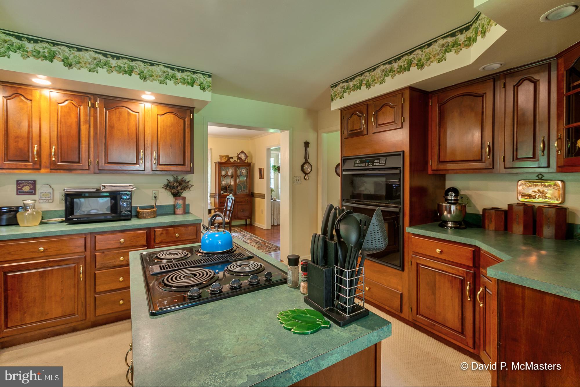 2390 Vineyard Road Falling Waters, WV 25419 - Photo 15 of 49 View from Kitchen into Dining room
