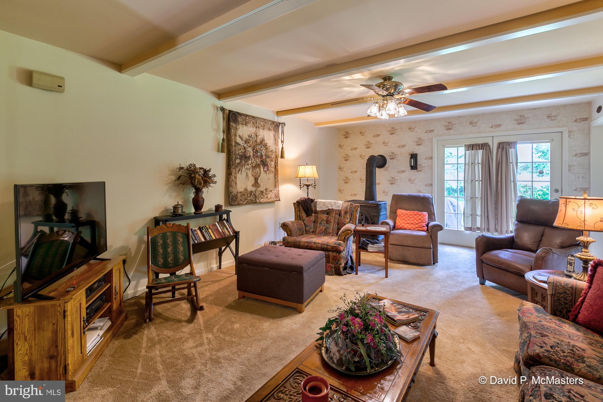 2390 Vineyard Road Falling Waters, WV 25419 - Photo 10 of 49 View Large Family Room with Beamed ceilings