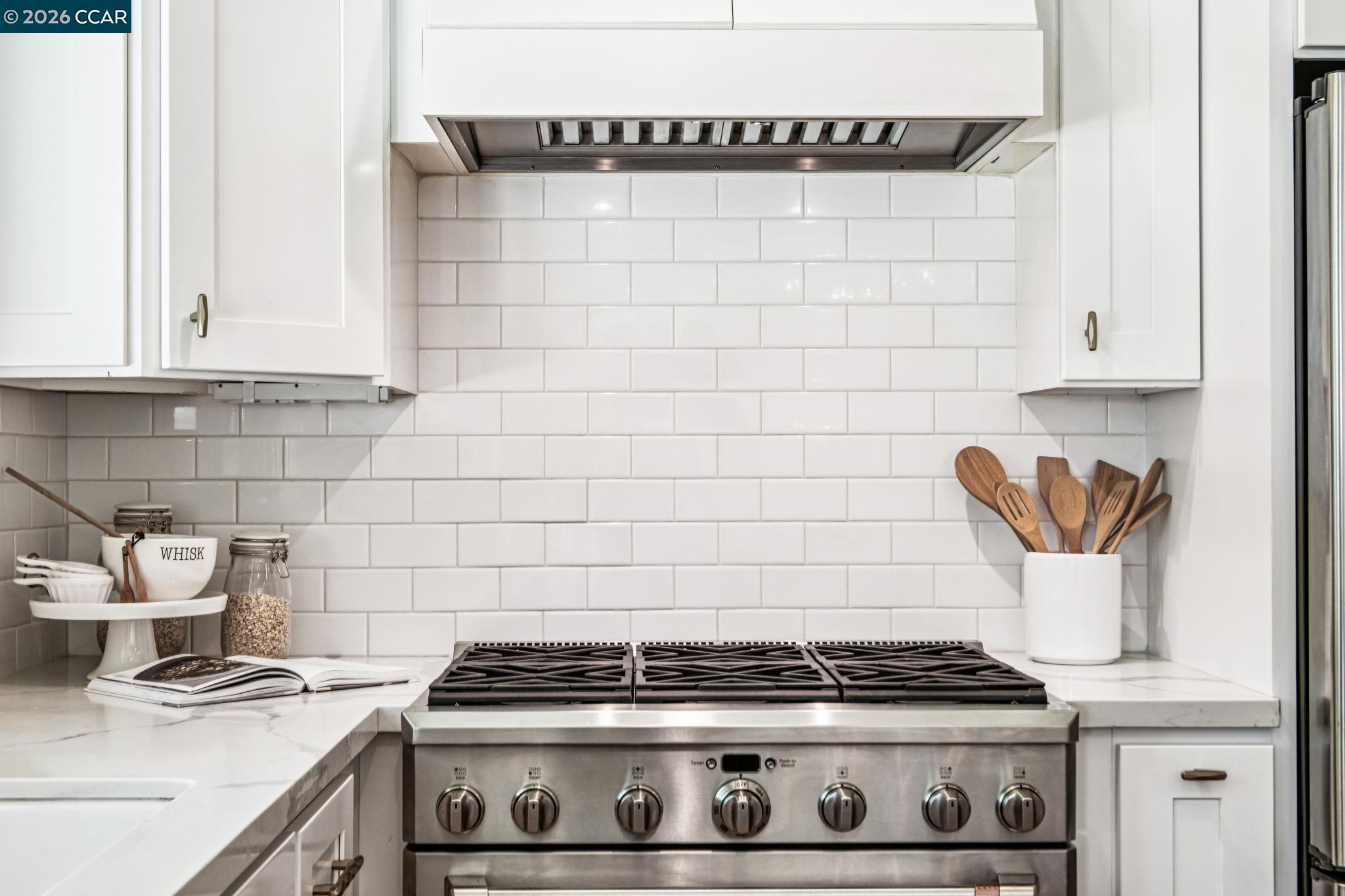 2941 Roundhill Road Alamo, CA 94507 - Photo 25 of 83 a stove top oven sitting inside of a kitchen