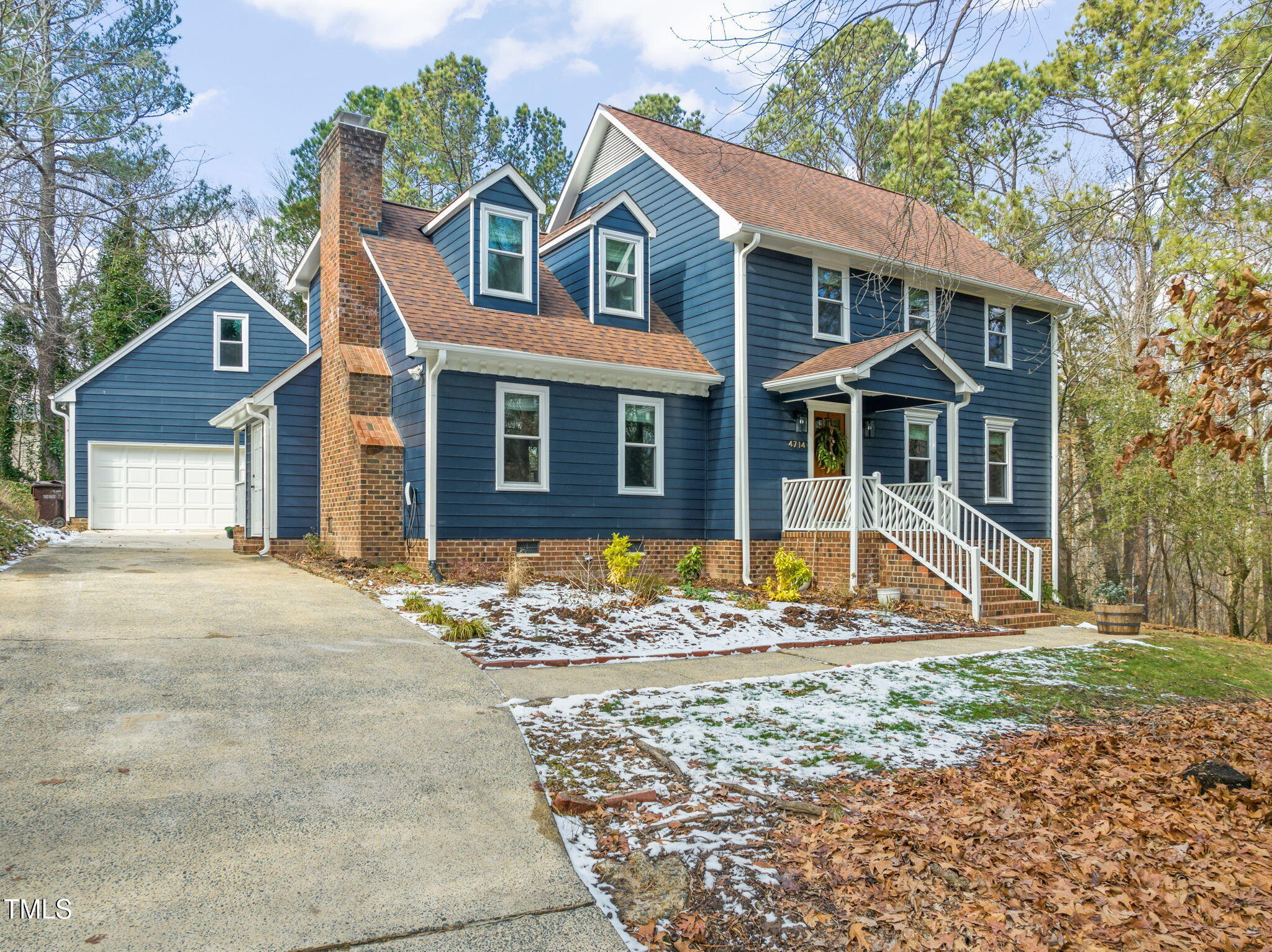 4714 Highgate Drive Durham, NC 27713 - Photo 1 of 50 a front view of a house with a yard
