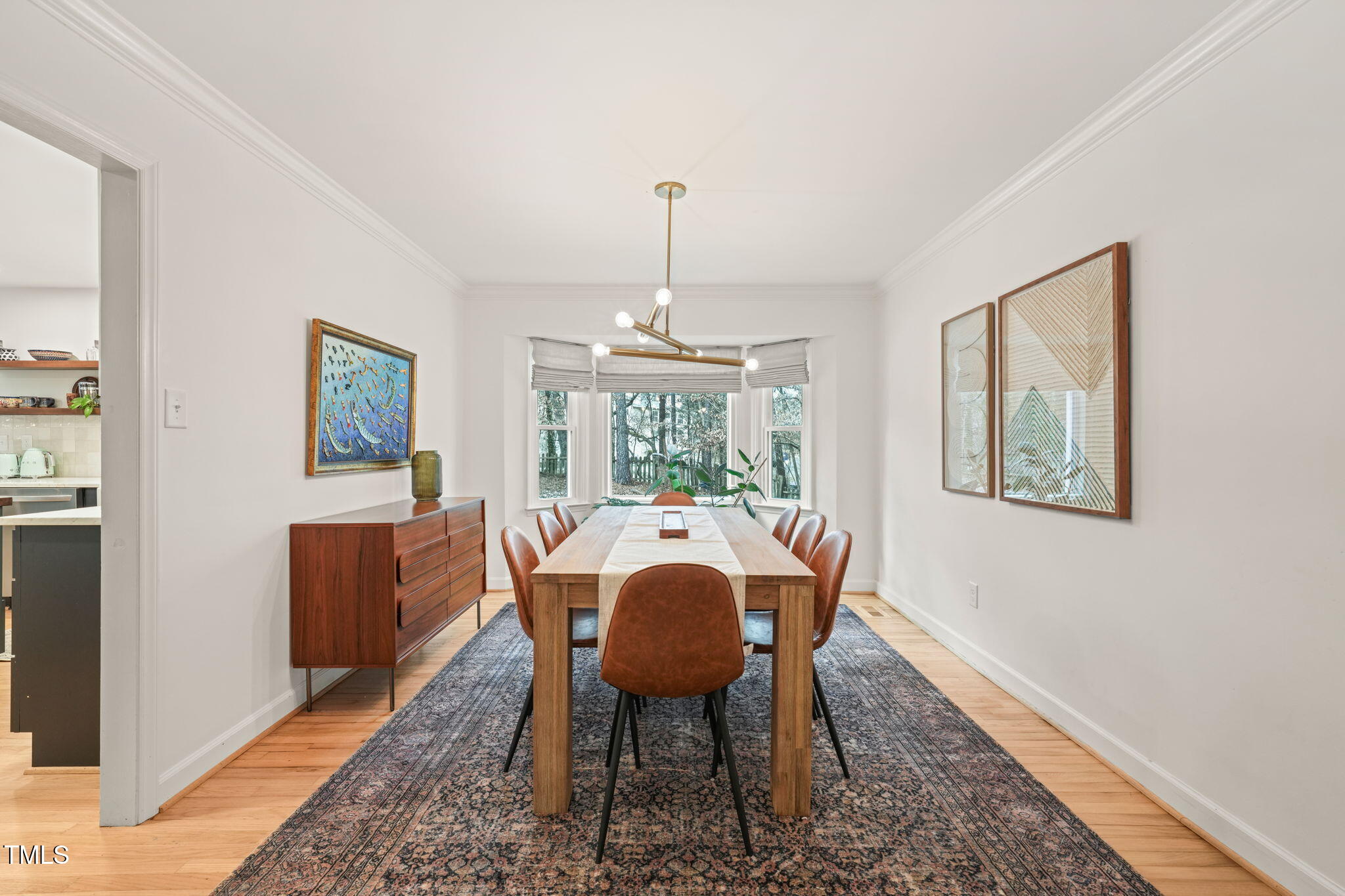 4714 Highgate Drive Durham, NC 27713 - Photo 11 of 50 a view of a dining room with furniture window and wooden floor