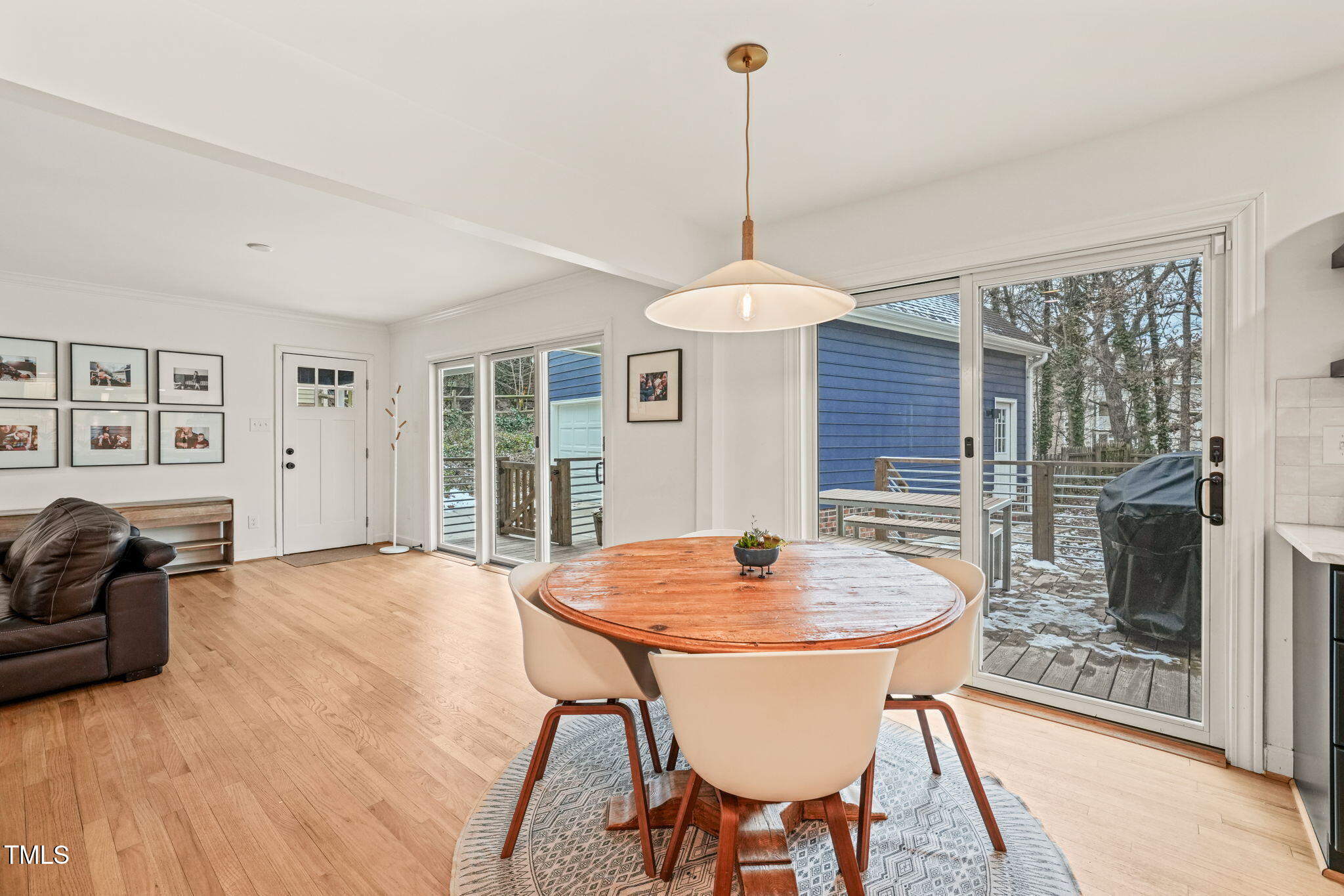 4714 Highgate Drive Durham, NC 27713 - Photo 20 of 50 a outdoor space with furniture and wooden floor