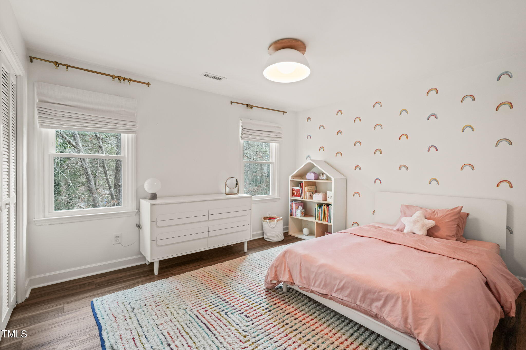 4714 Highgate Drive Durham, NC 27713 - Photo 31 of 50 a bedroom with a bed and a window