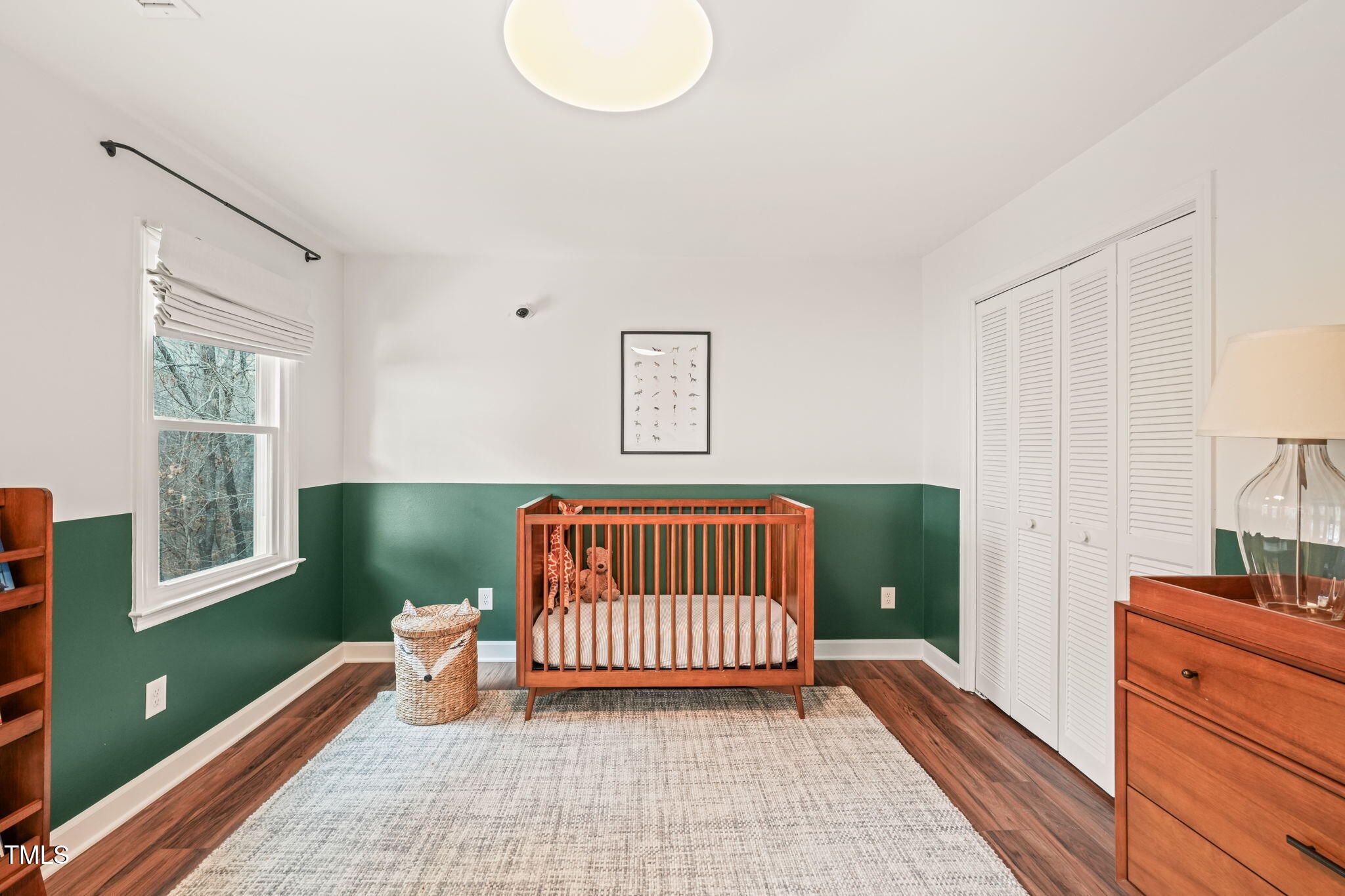 4714 Highgate Drive Durham, NC 27713 - Photo 34 of 50 a bedroom with a bed and a window