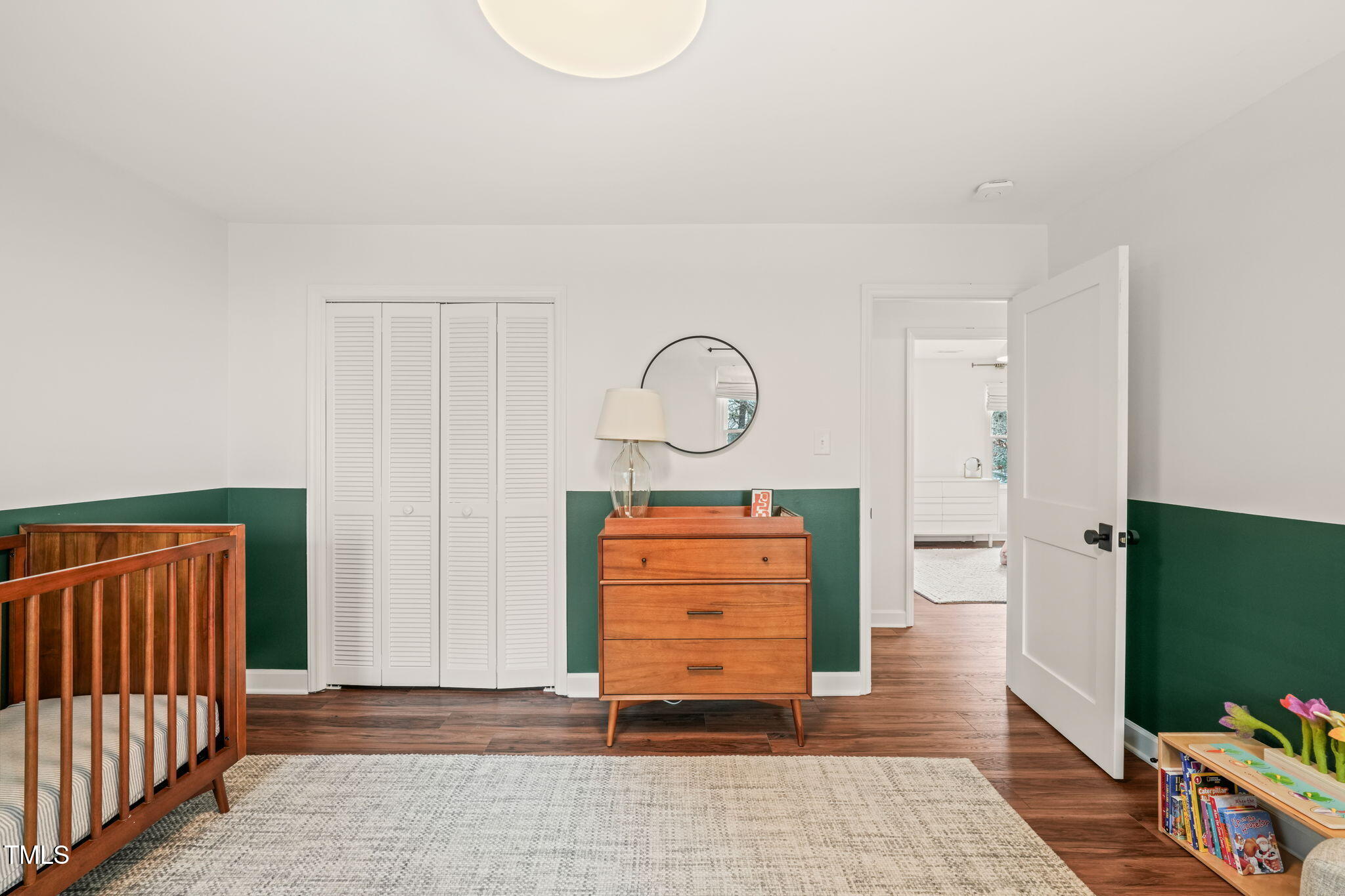 4714 Highgate Drive Durham, NC 27713 - Photo 35 of 50 an empty room with mirror and window
