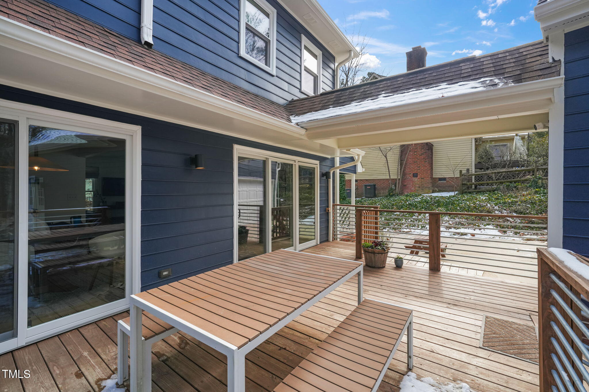 4714 Highgate Drive Durham, NC 27713 - Photo 42 of 50 a balcony view with a large window and couch