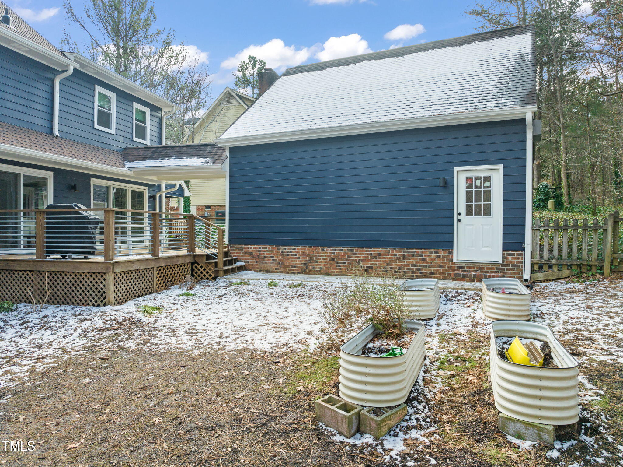 4714 Highgate Drive Durham, NC 27713 - Photo 44 of 50 a view of a house with a backyard and sitting area