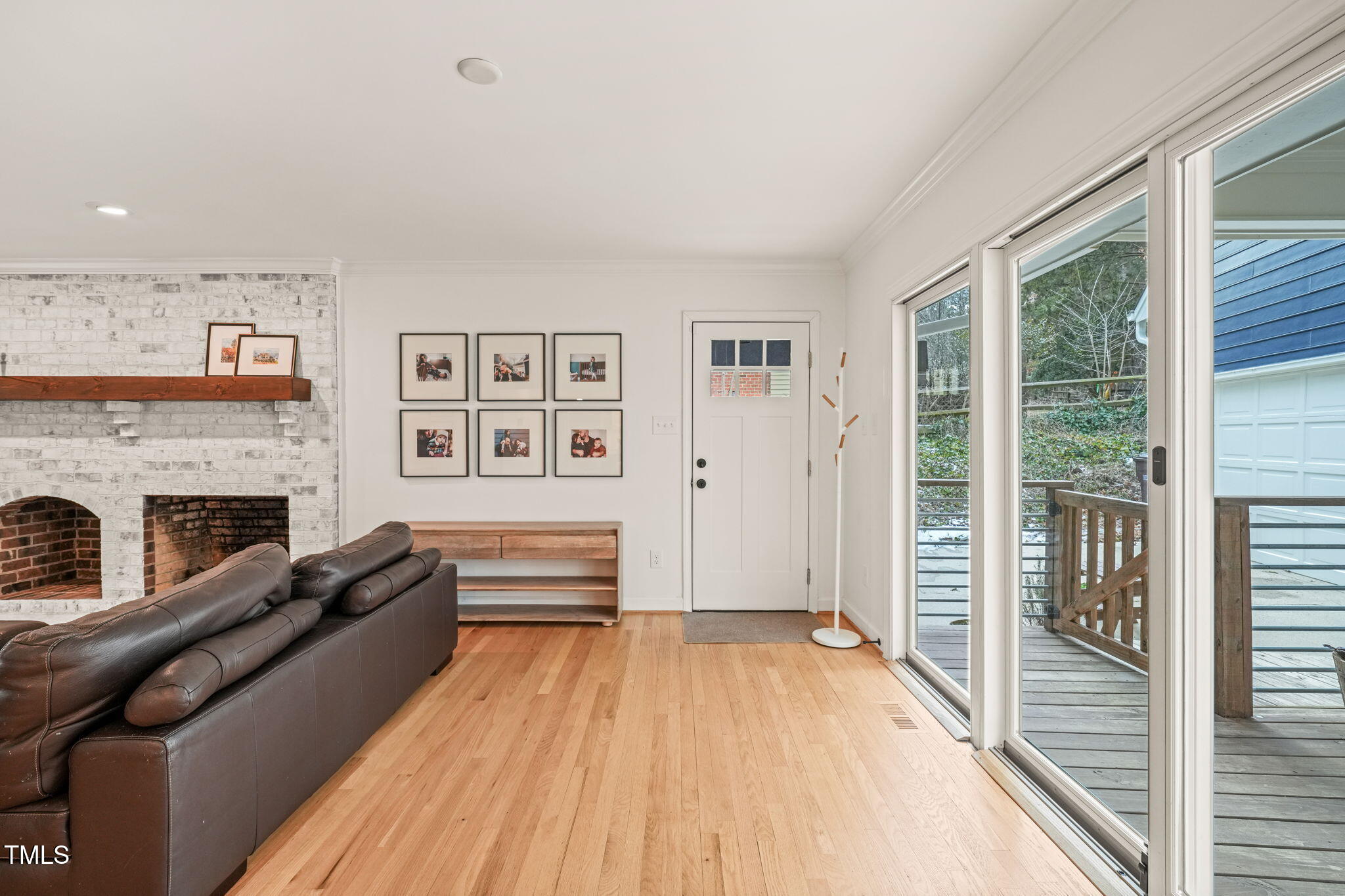 4714 Highgate Drive Durham, NC 27713 - Photo 7 of 50 a view of livingroom with furniture flat screen tv and windows
