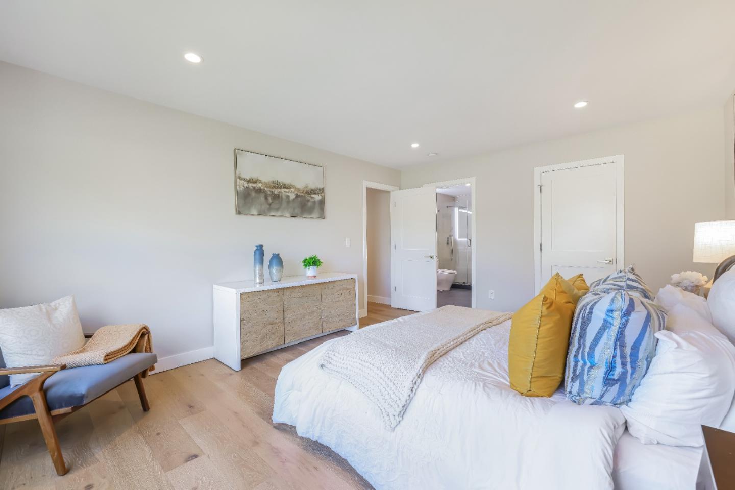 1120 Springfield Drive Campbell, CA 95008 - Photo 16 of 48 a bedroom with a bed and a chair