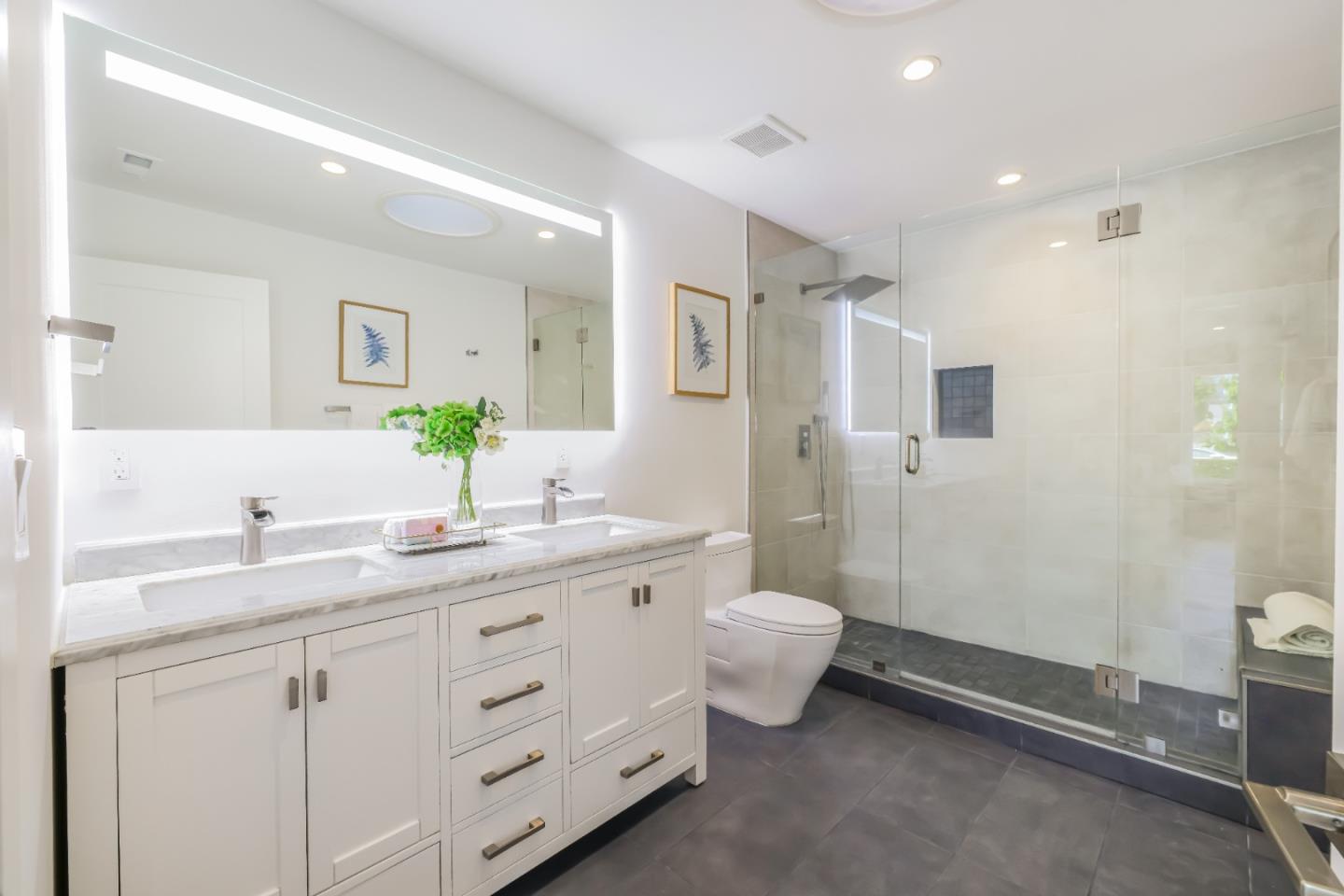 1120 Springfield Drive Campbell, CA 95008 - Photo 17 of 48 a spacious bathroom with a granite countertop sink mirror and toilet