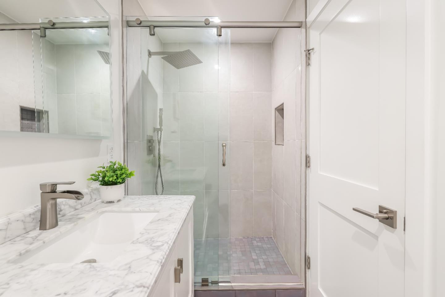 1120 Springfield Drive Campbell, CA 95008 - Photo 22 of 48 a bathroom with a granite countertop shower sink and vanity