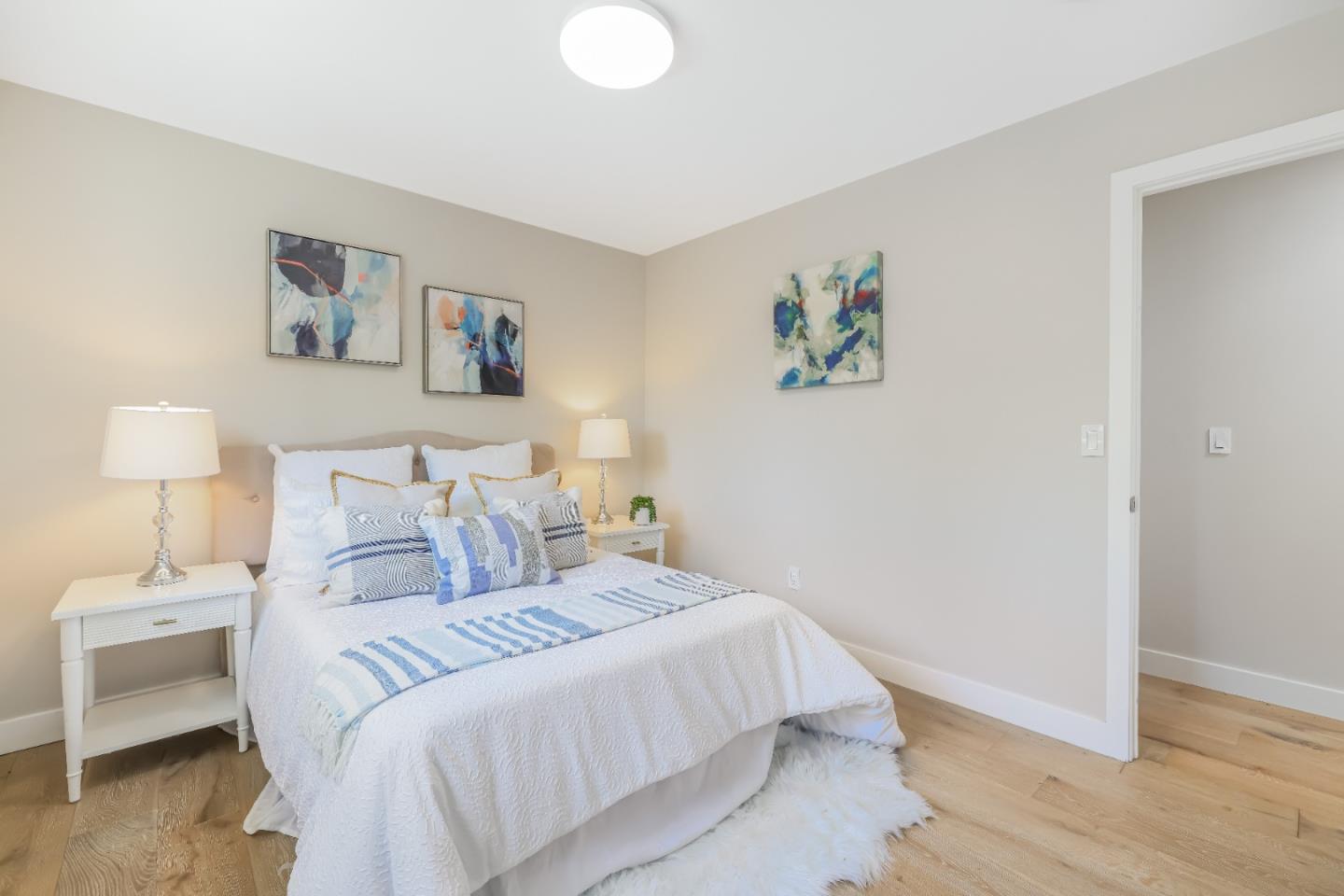 1120 Springfield Drive Campbell, CA 95008 - Photo 25 of 48 a bedroom with a bed and a lamp