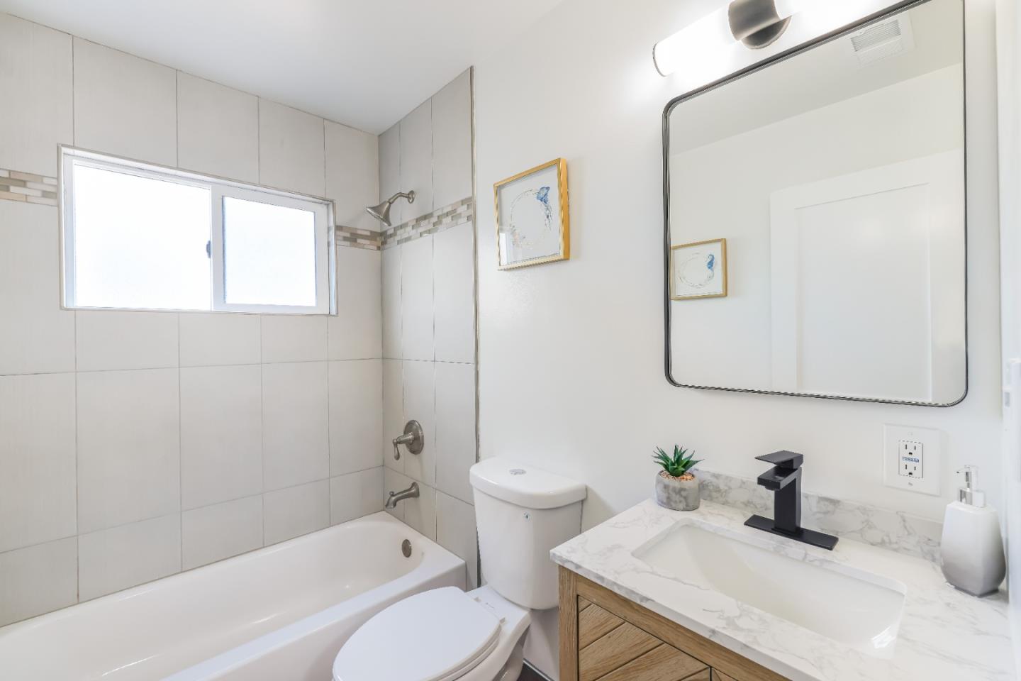 1120 Springfield Drive Campbell, CA 95008 - Photo 31 of 48 a bathroom with a sink a toilet and shower