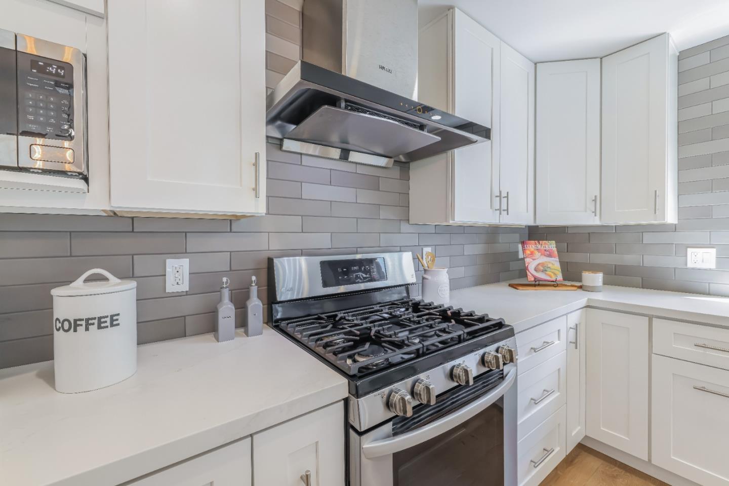 1120 Springfield Drive Campbell, CA 95008 - Photo 33 of 48 a white stove top oven sitting inside of a kitchen