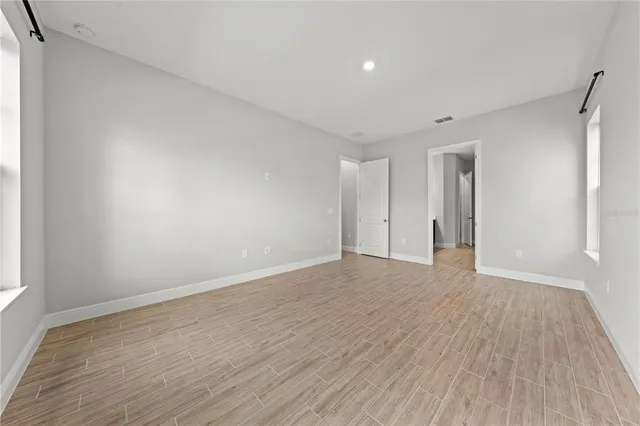 a view of a room with racks on the wall