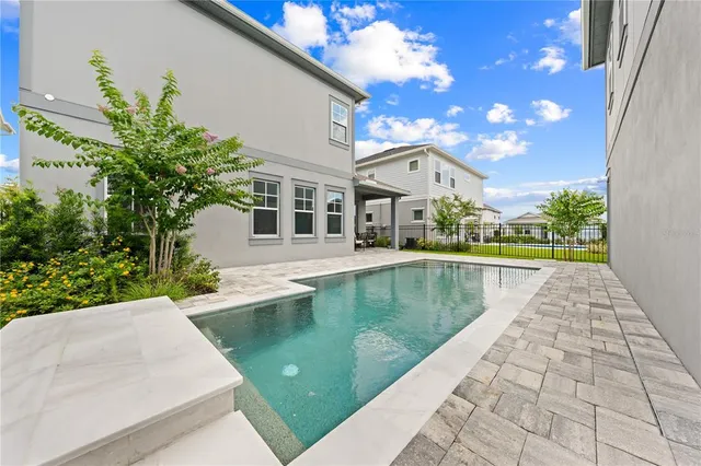 a view of an ocean and city