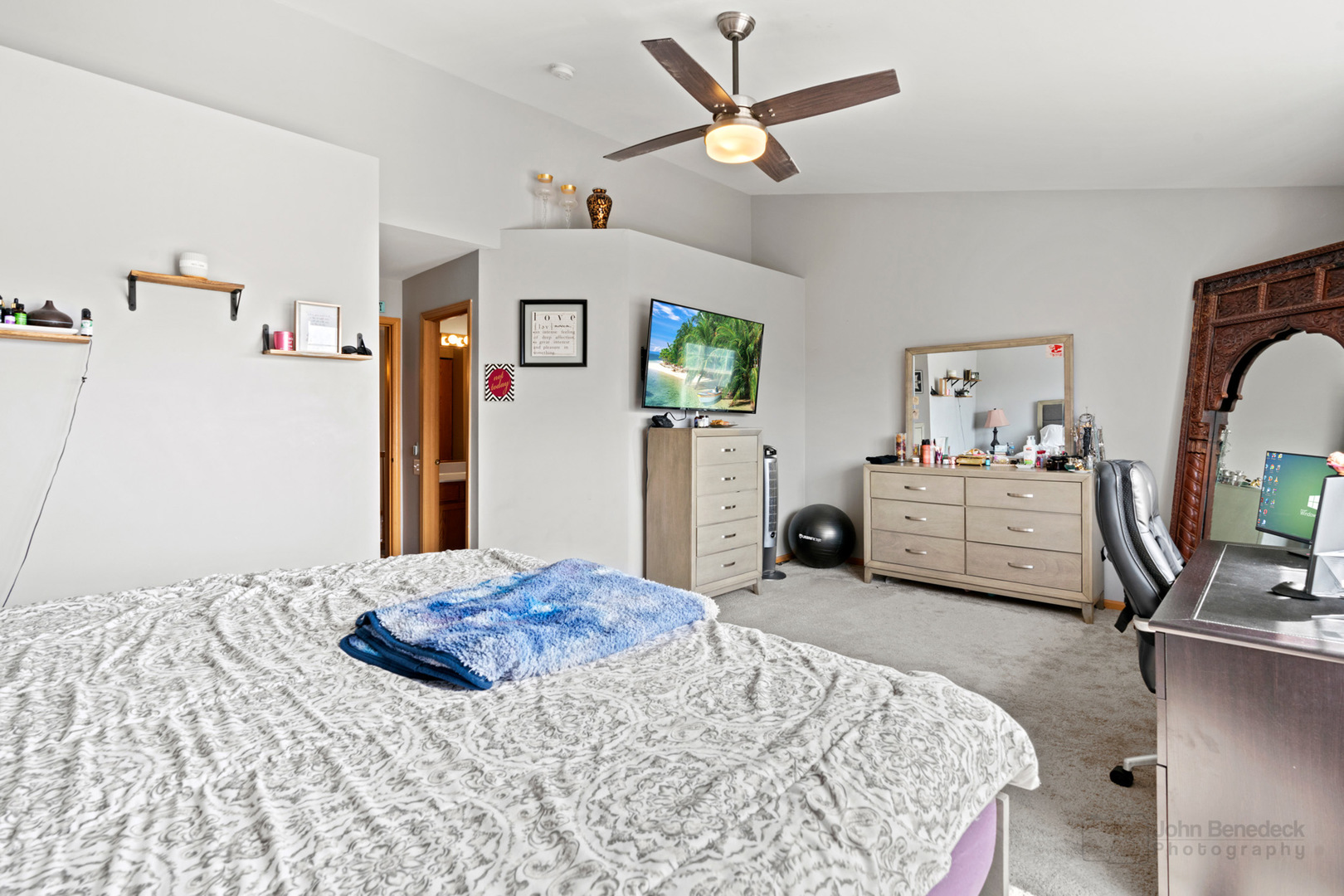 1106 Delta Drive Elgin, IL 60123 - Photo 14 of 26 a bedroom with a bed a couch and a chandelier