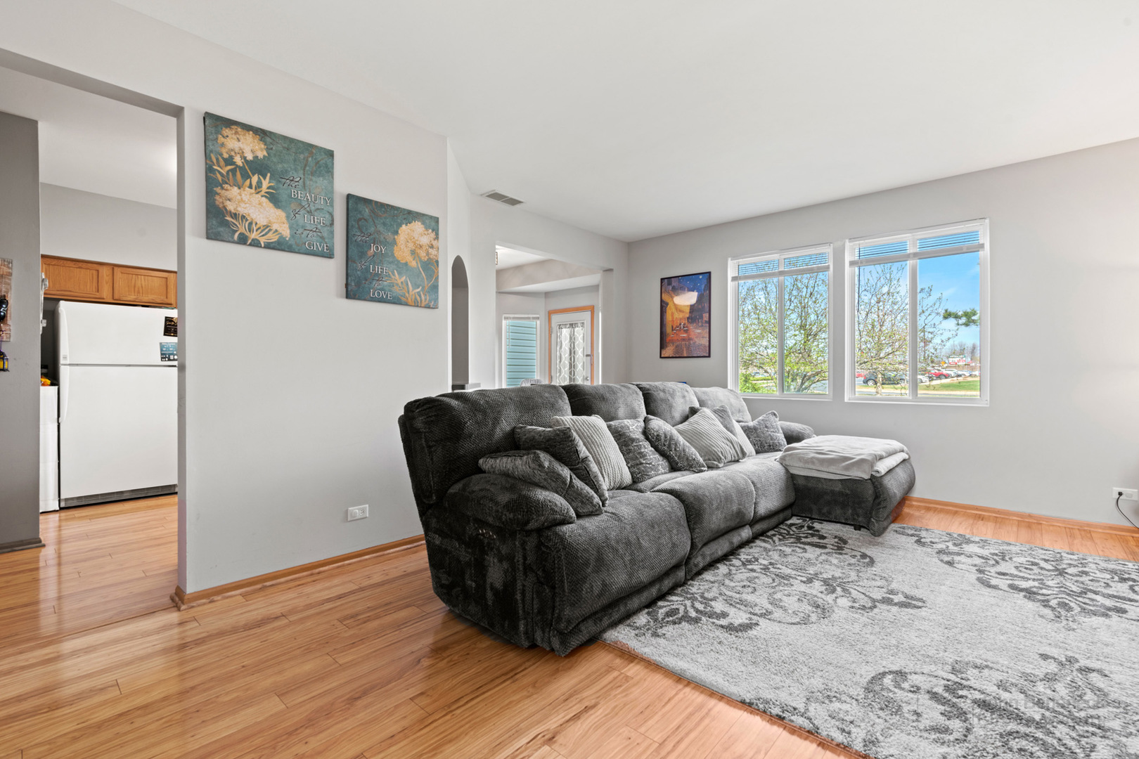 1106 Delta Drive Elgin, IL 60123 - Photo 2 of 26 a living room with furniture and a window