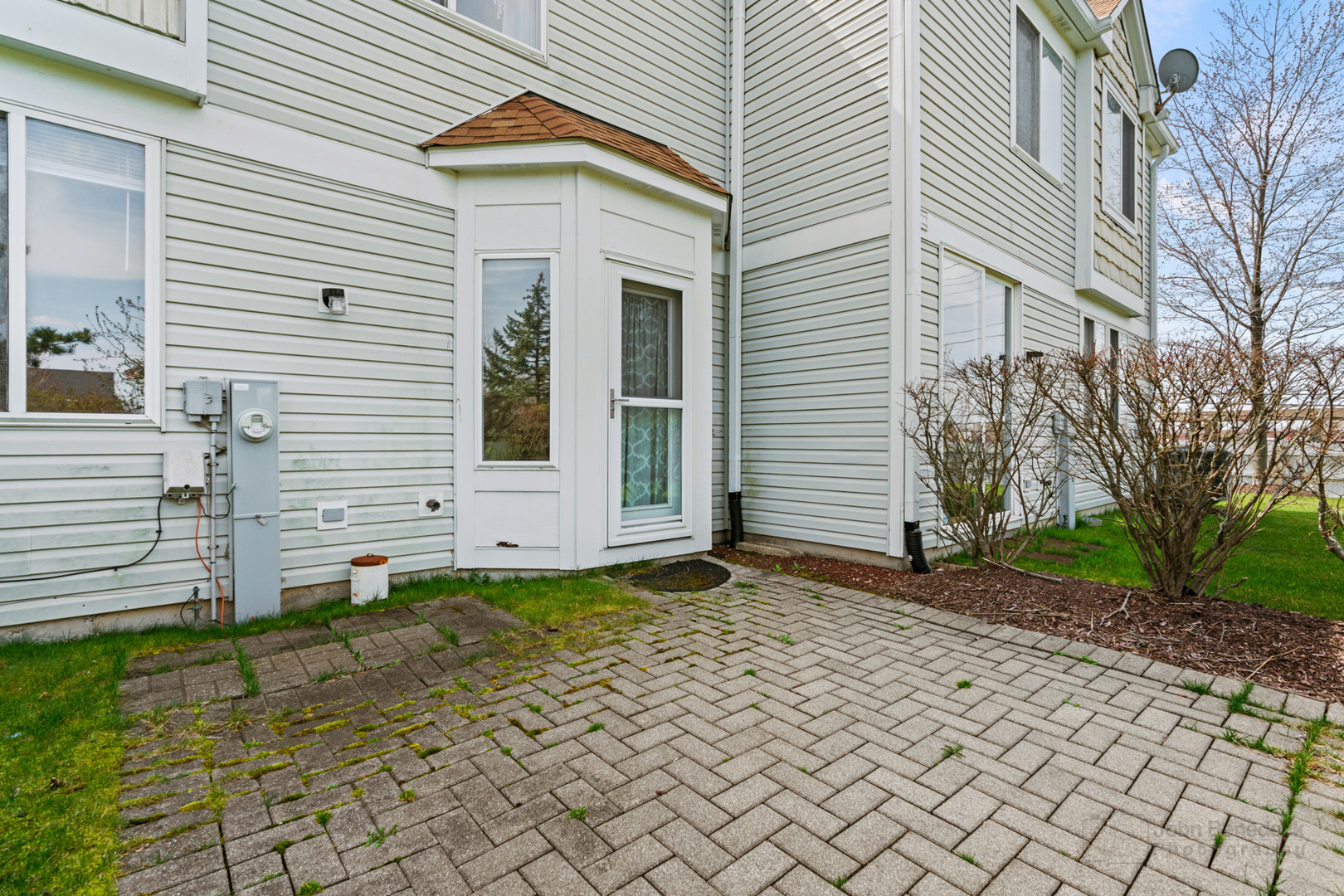 1106 Delta Drive Elgin, IL 60123 - Photo 23 of 26 a front view of a house with a yard