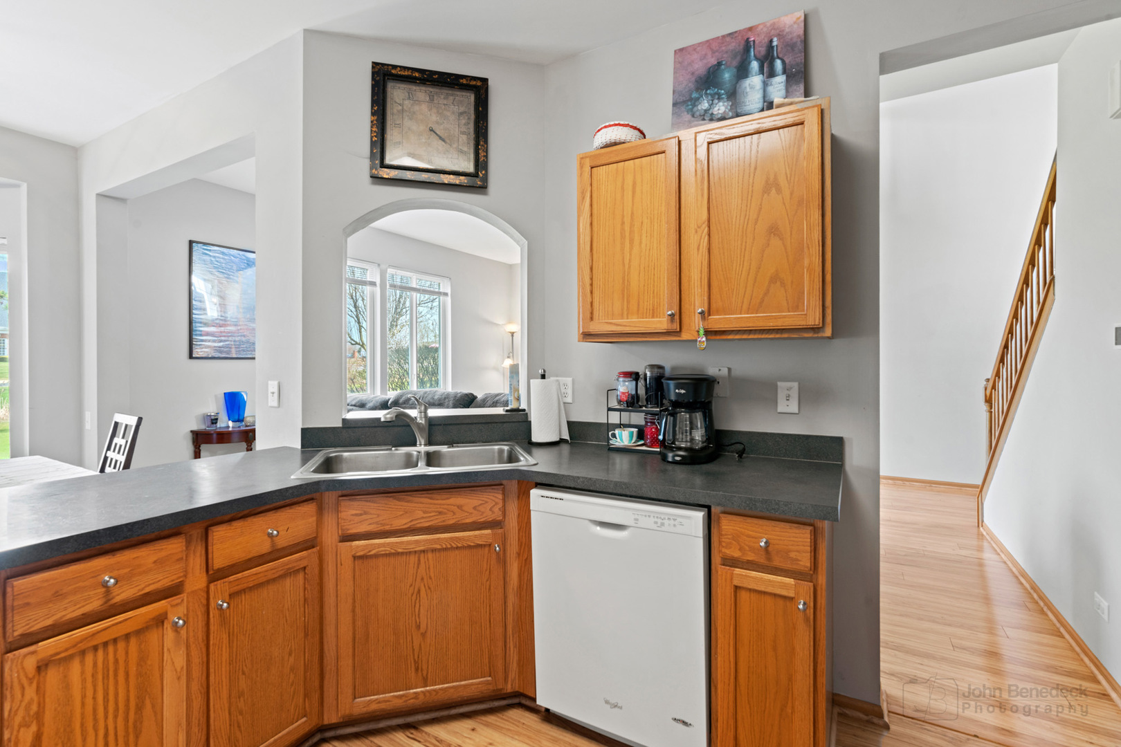 1106 Delta Drive Elgin, IL 60123 - Photo 10 of 26 a kitchen with granite countertop a sink a stove a counter top space and cabinets