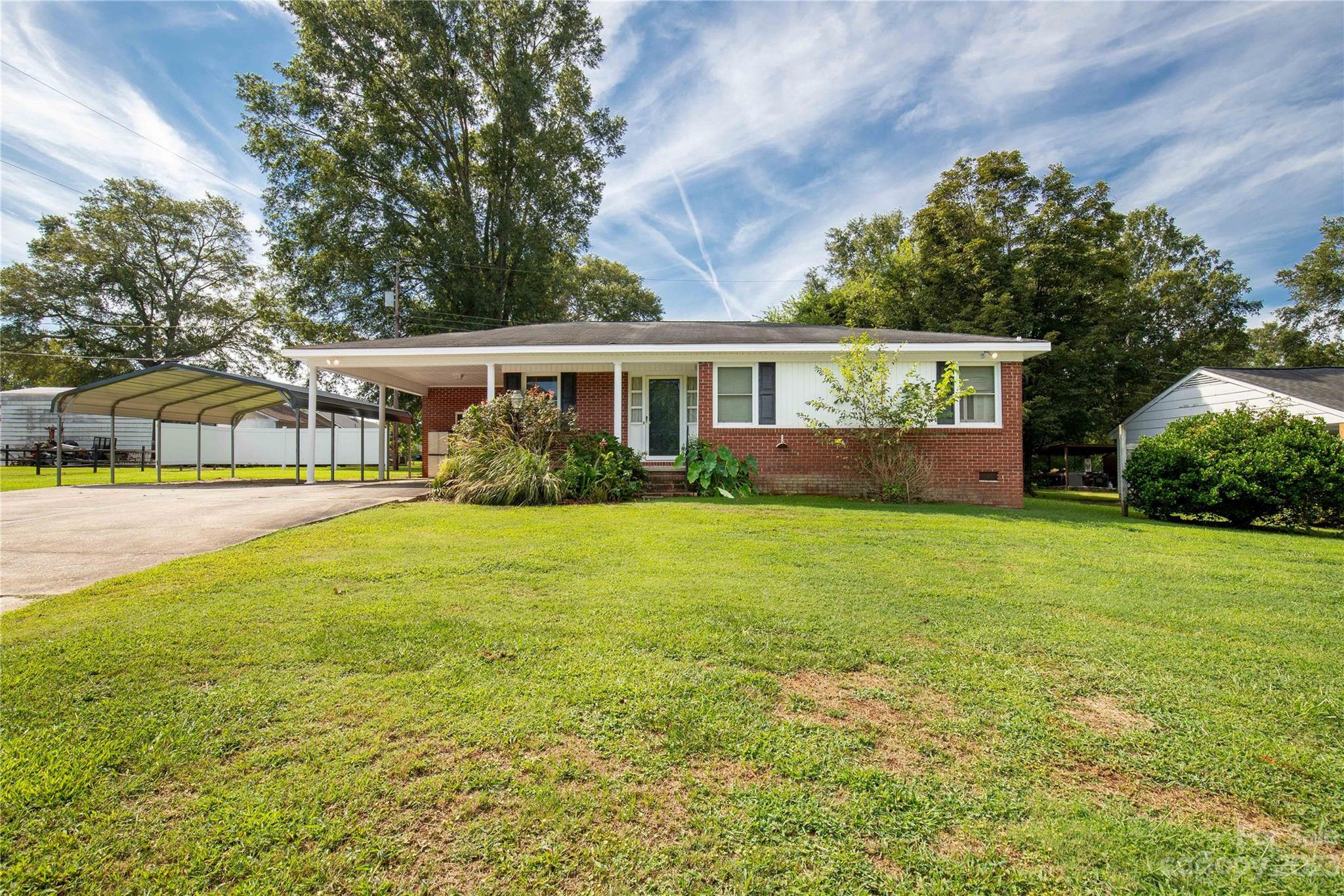 1323 Westwood Road Lancaster, SC 29720 - Photo 1 of 25 a front view of house with yard and green space