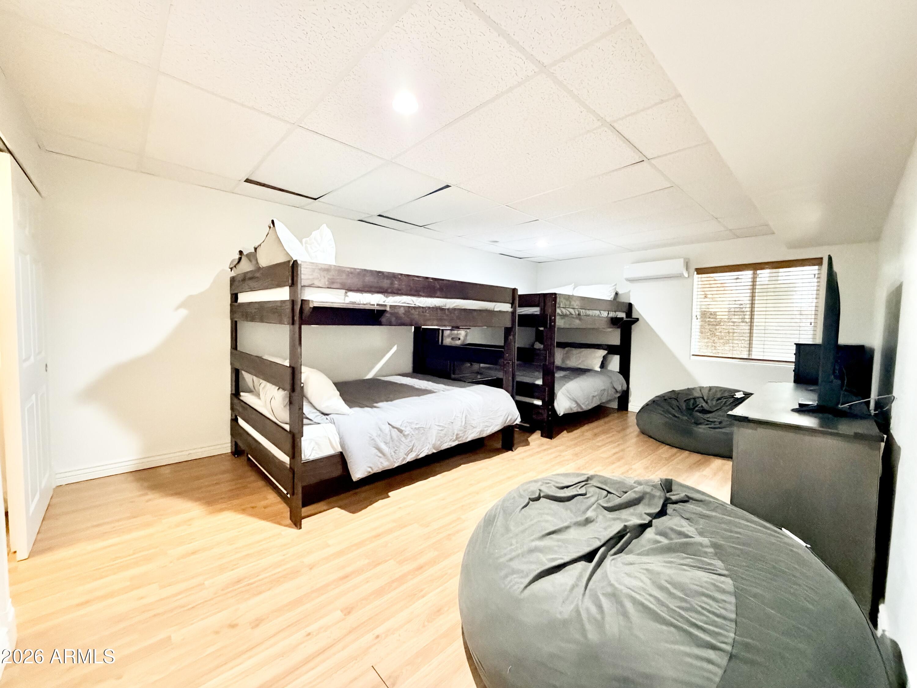 6870 Robbin Lane Pine, AZ 85544 - Photo 15 of 37 a bedroom with bed and window