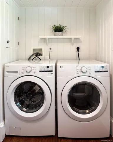 a utility room with dryer and washer