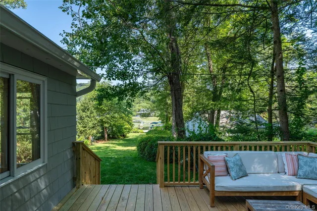 a view of roof deck with furniture