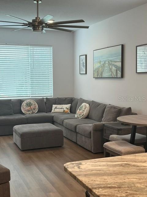 7978 Southwest 90th Terrace Ocala, FL 34481 - Photo 7 of 20 a living room with couches and painting on the wall