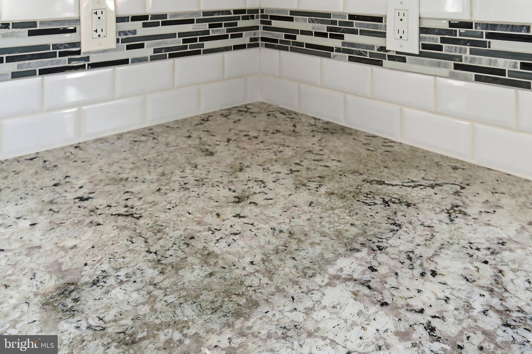 183 Jordan Road Somers Point, NJ 08244 - Photo 15 of 40 a close view of a stove top oven and cabinets