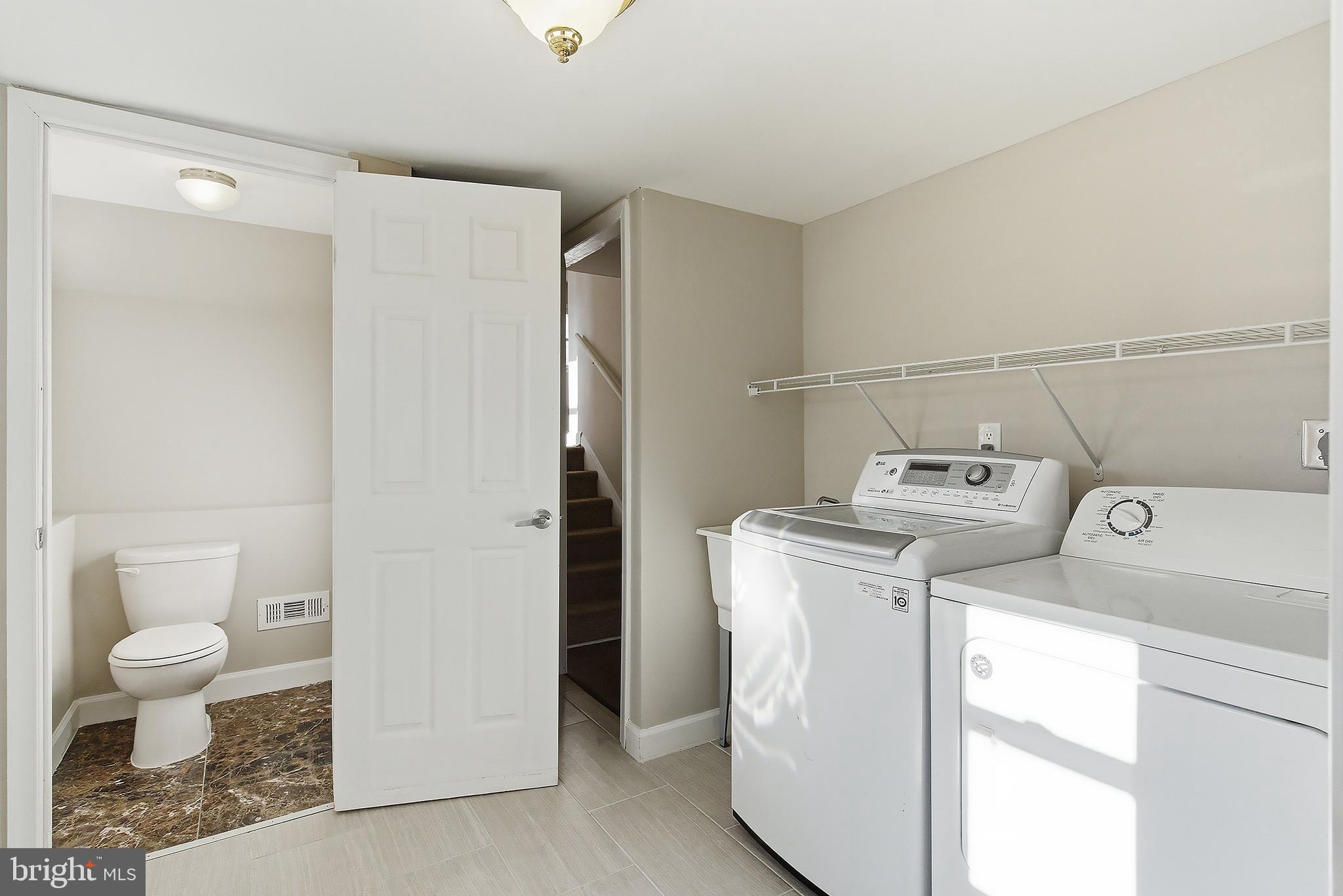 183 Jordan Road Somers Point, NJ 08244 - Photo 37 of 40 a utility room with dryer and washer