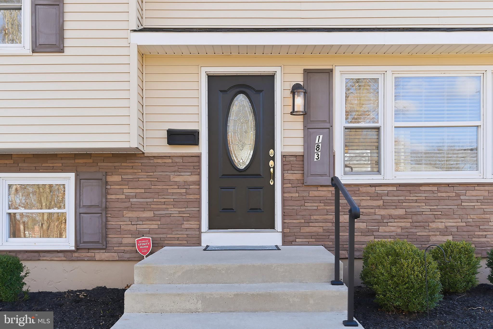 183 Jordan Road Somers Point, NJ 08244 - Photo 5 of 40 a front view of a house with a garden