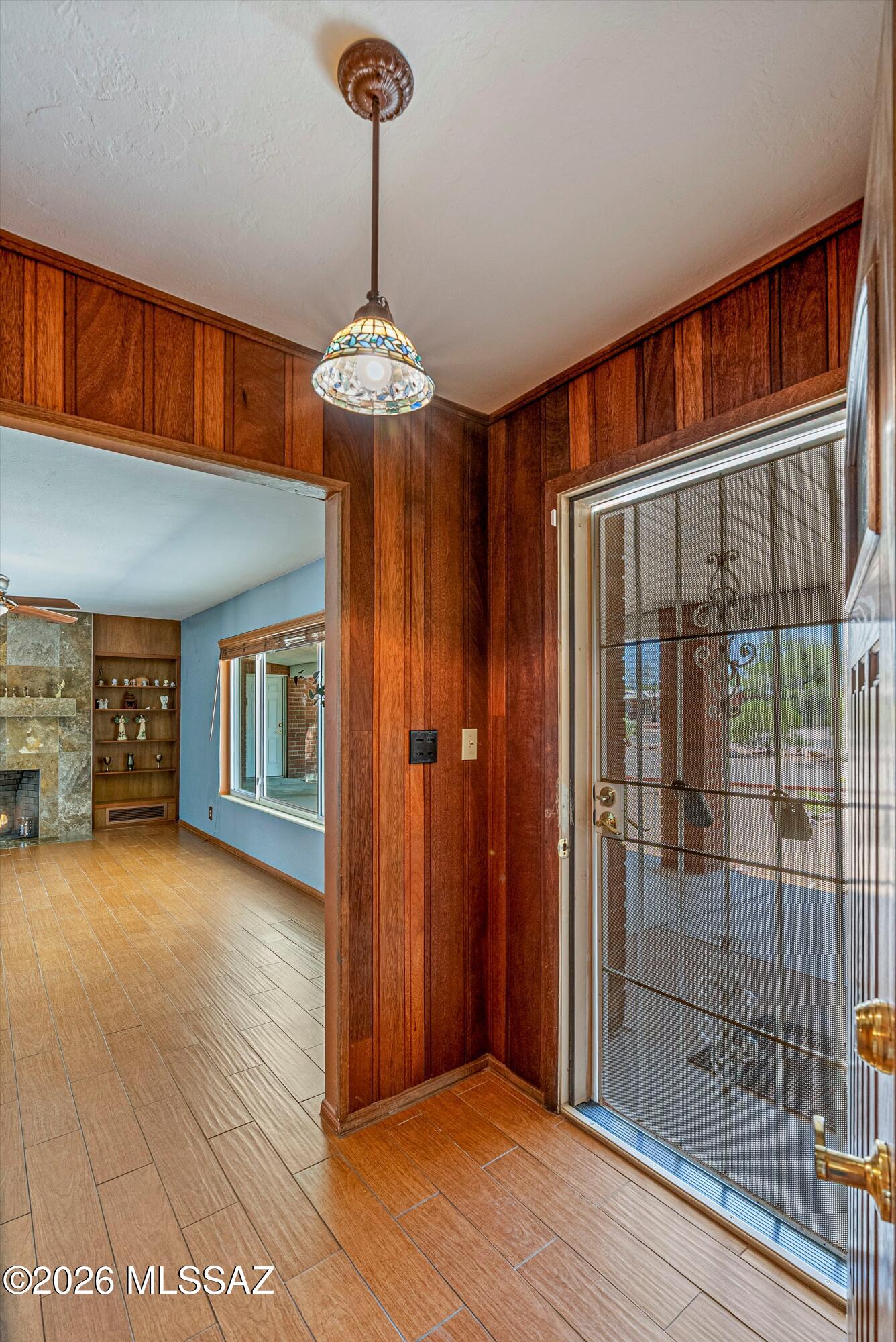 2107 East Lind Road Tucson, AZ 85719 - Photo 5 of 43 a view of a room with a chandelier