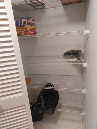 a view of a balcony with a yard