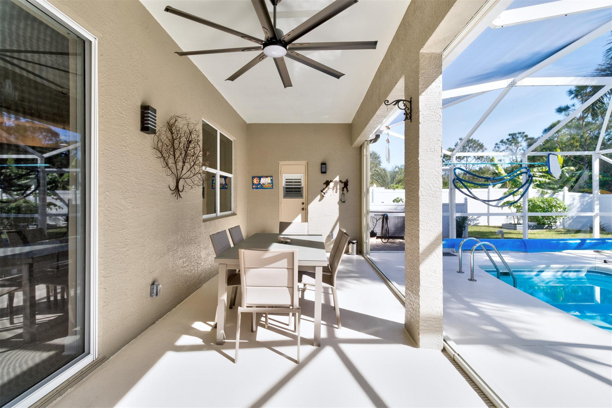 107 Stony Point Drive Sebastian, FL 32958 - Photo 24 of 34 Spacious lanai w/3 separate access doors