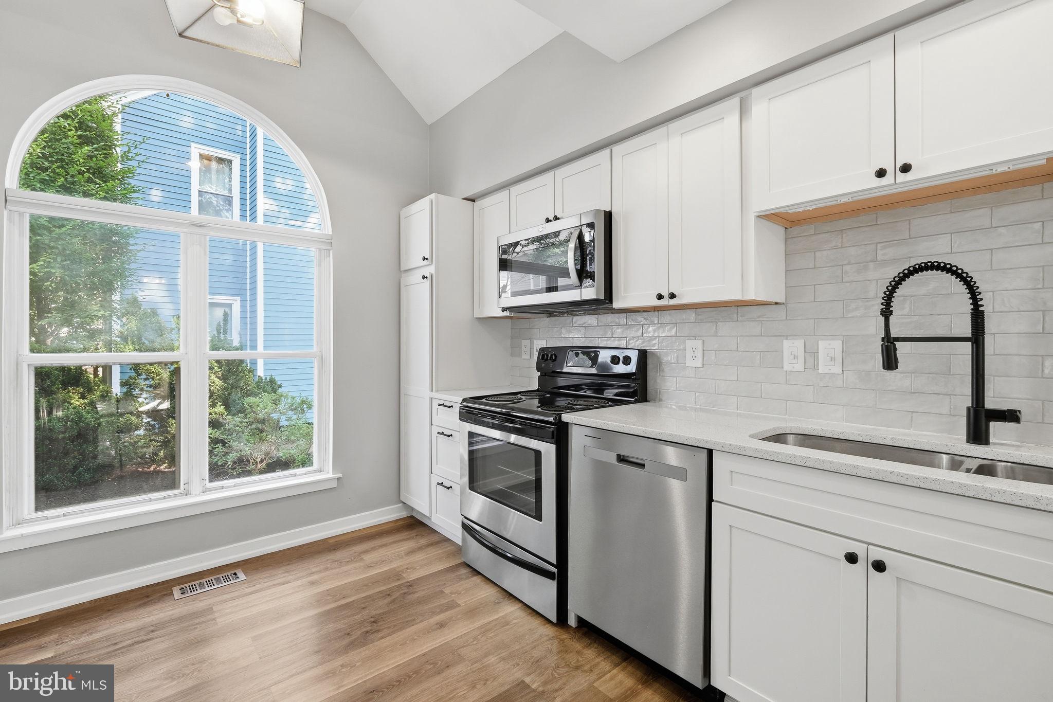 1529 Ritchie Lane Annapolis, MD 21401 - Photo 10 of 35 Bright and airy modern kitchen space.
