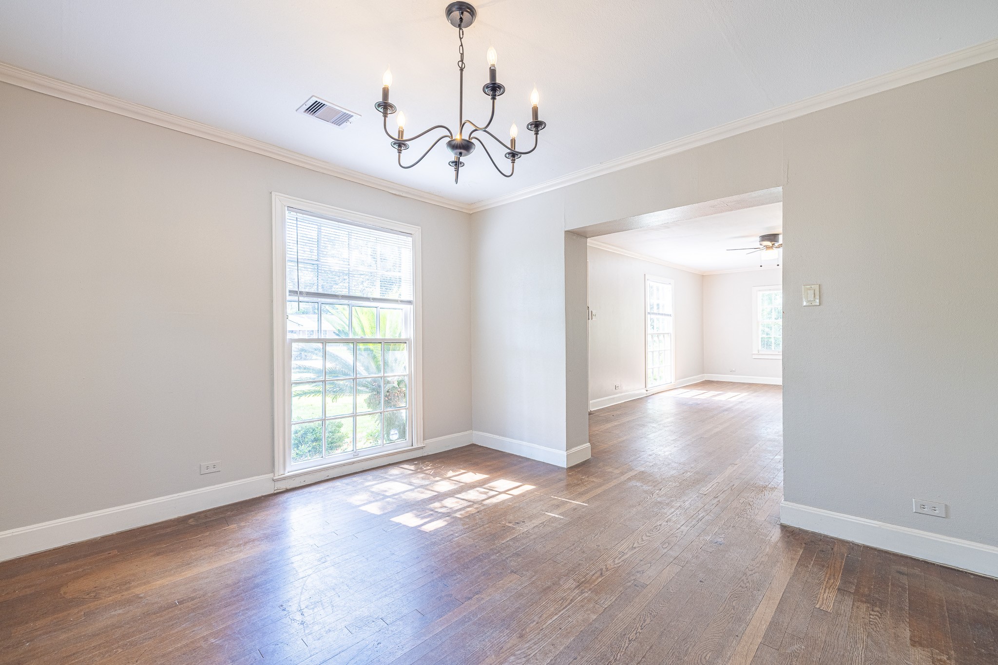 8548 Findlay Street Houston, TX 77017 - Photo 13 of 50 wooden floor in an empty room with a window