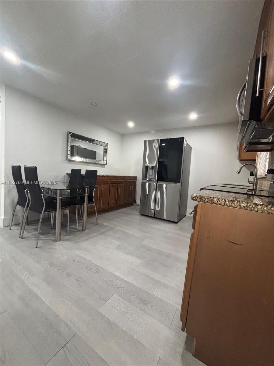 12888 Southwest 17th Street Miami, FL 33175 - Photo 19 of 19 a view of a kitchen with furniture and a kitchen