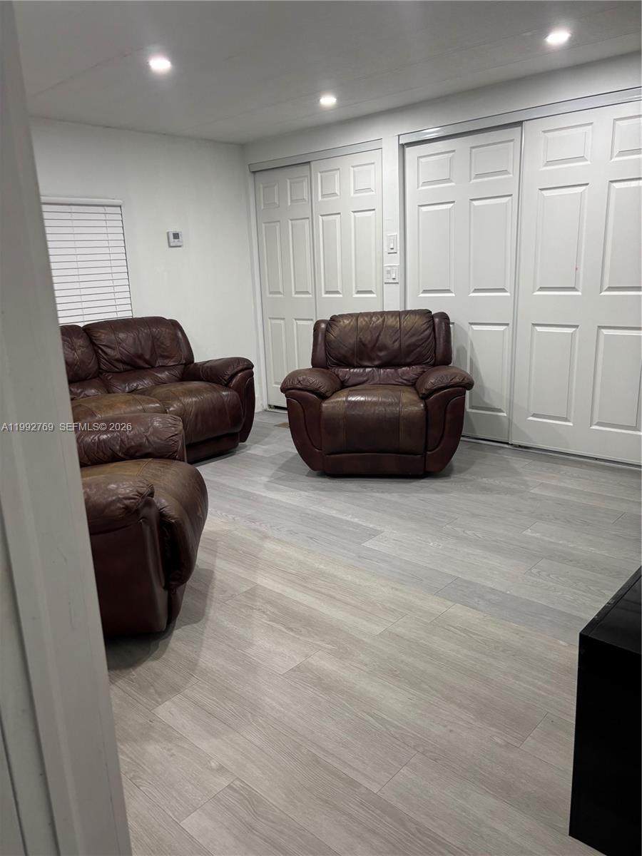 12888 Southwest 17th Street Miami, FL 33175 - Photo 6 of 19 a living room with furniture and a couch