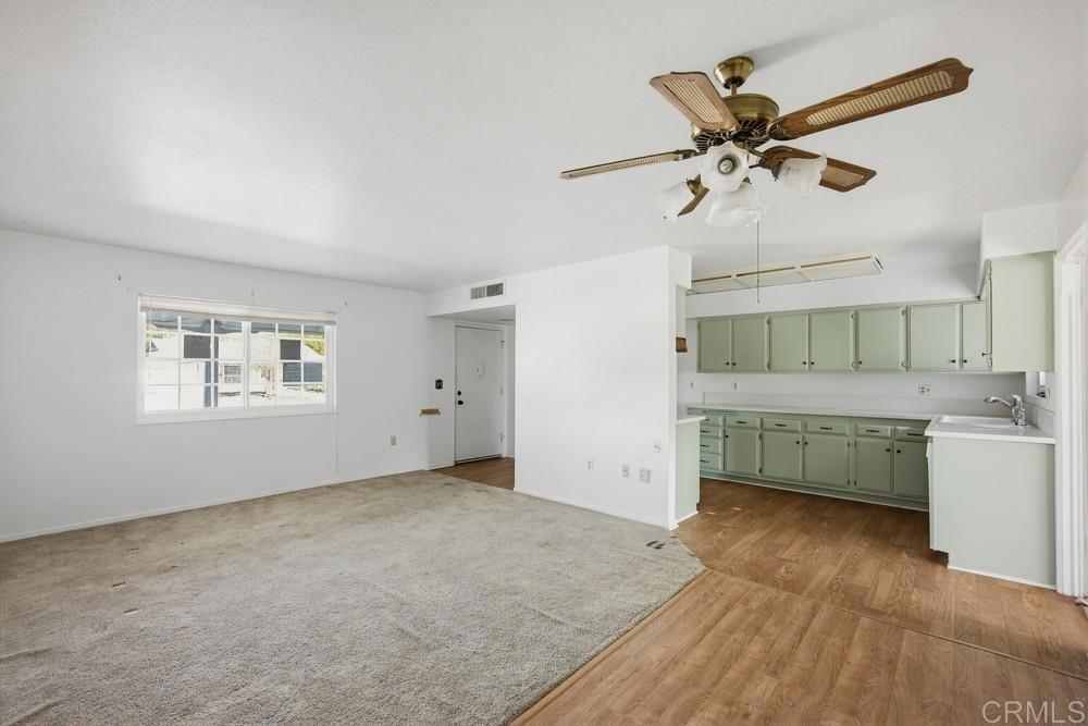 27077 El Rancho Road Menifee, CA 92586 - Photo 12 of 31 a view of room with a ceiling fan