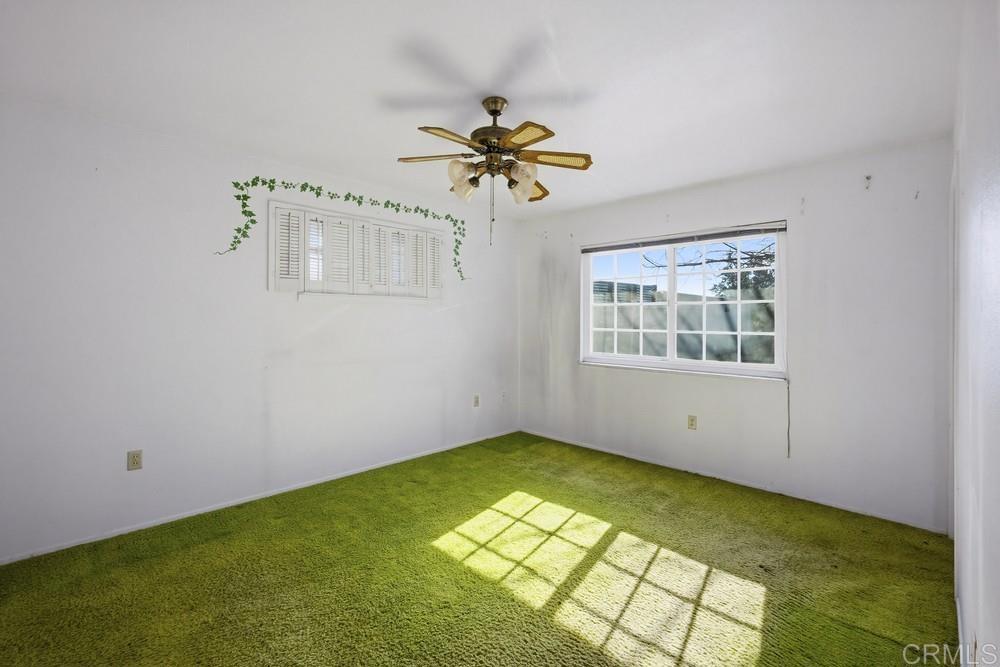 27077 El Rancho Road Menifee, CA 92586 - Photo 20 of 31 a view of an empty room with a window