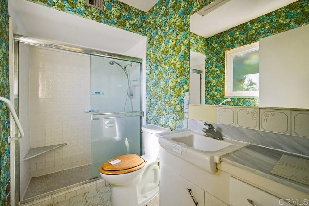 27077 El Rancho Road Menifee, CA 92586 - Photo 22 of 31 a bathroom with a sink toilet and shower