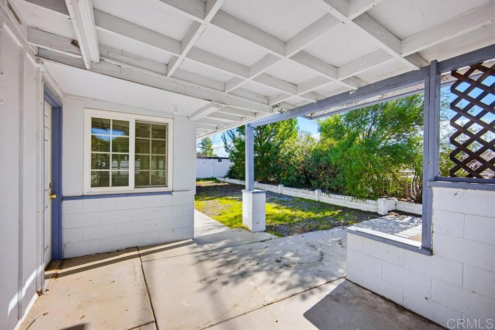 27077 El Rancho Road Menifee, CA 92586 - Photo 27 of 31 a view of a swimming pool with a porch