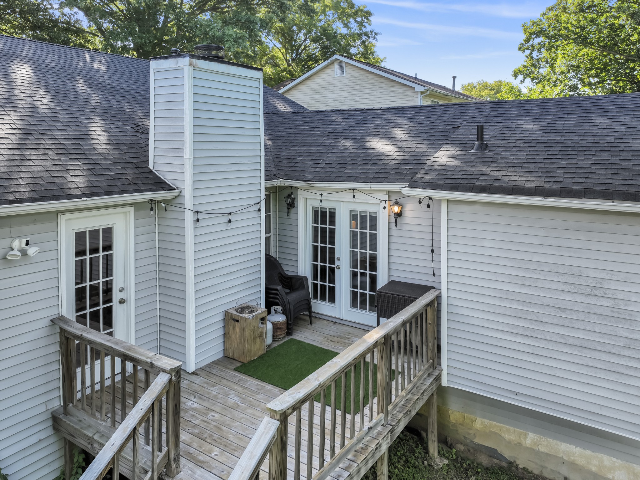 829 Bishopsgate Road Antioch, TN 37013 - Photo 4 of 18 a view of house with wooden deck and furniture