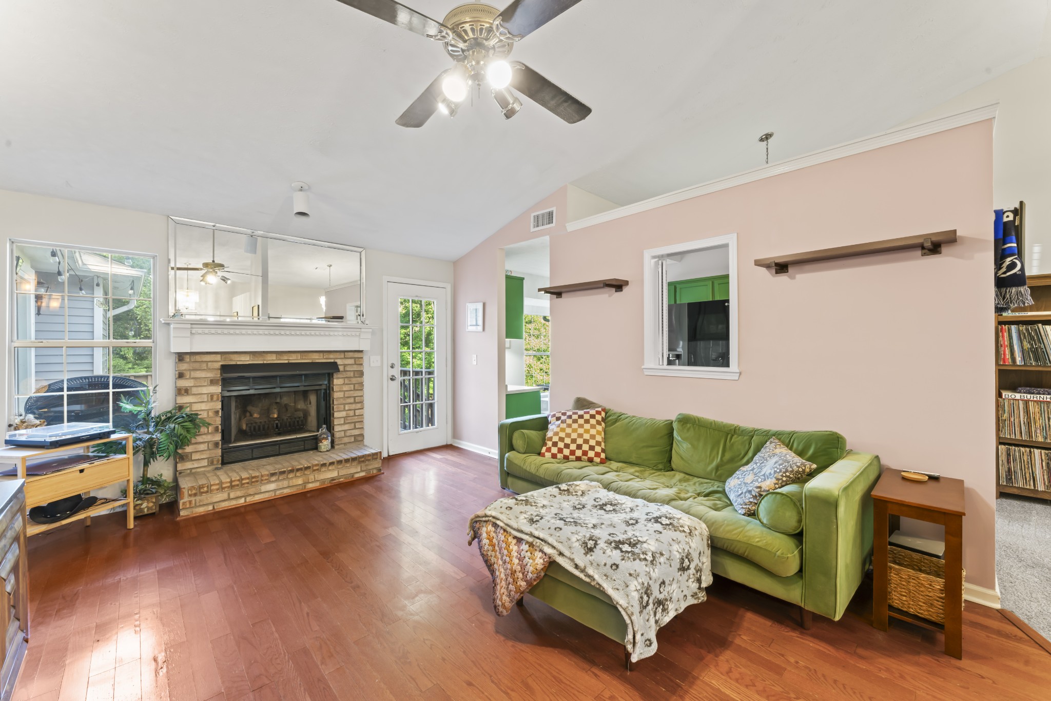 829 Bishopsgate Road Antioch, TN 37013 - Photo 6 of 18 a living room with furniture and a fireplace