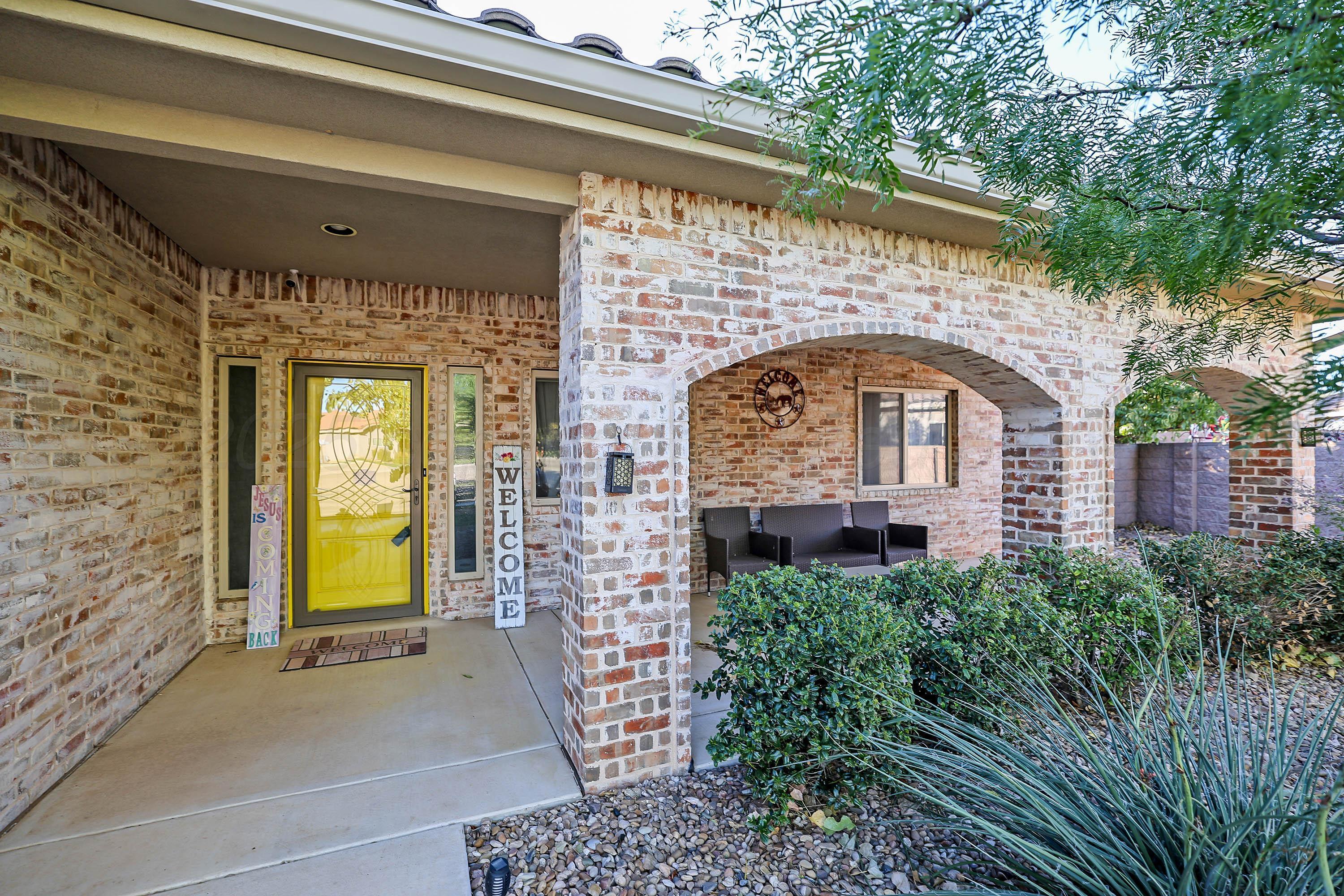 1003 Cabernet Way Amarillo, TX 79124 - Photo 2 of 36 a front view of a house with large windows