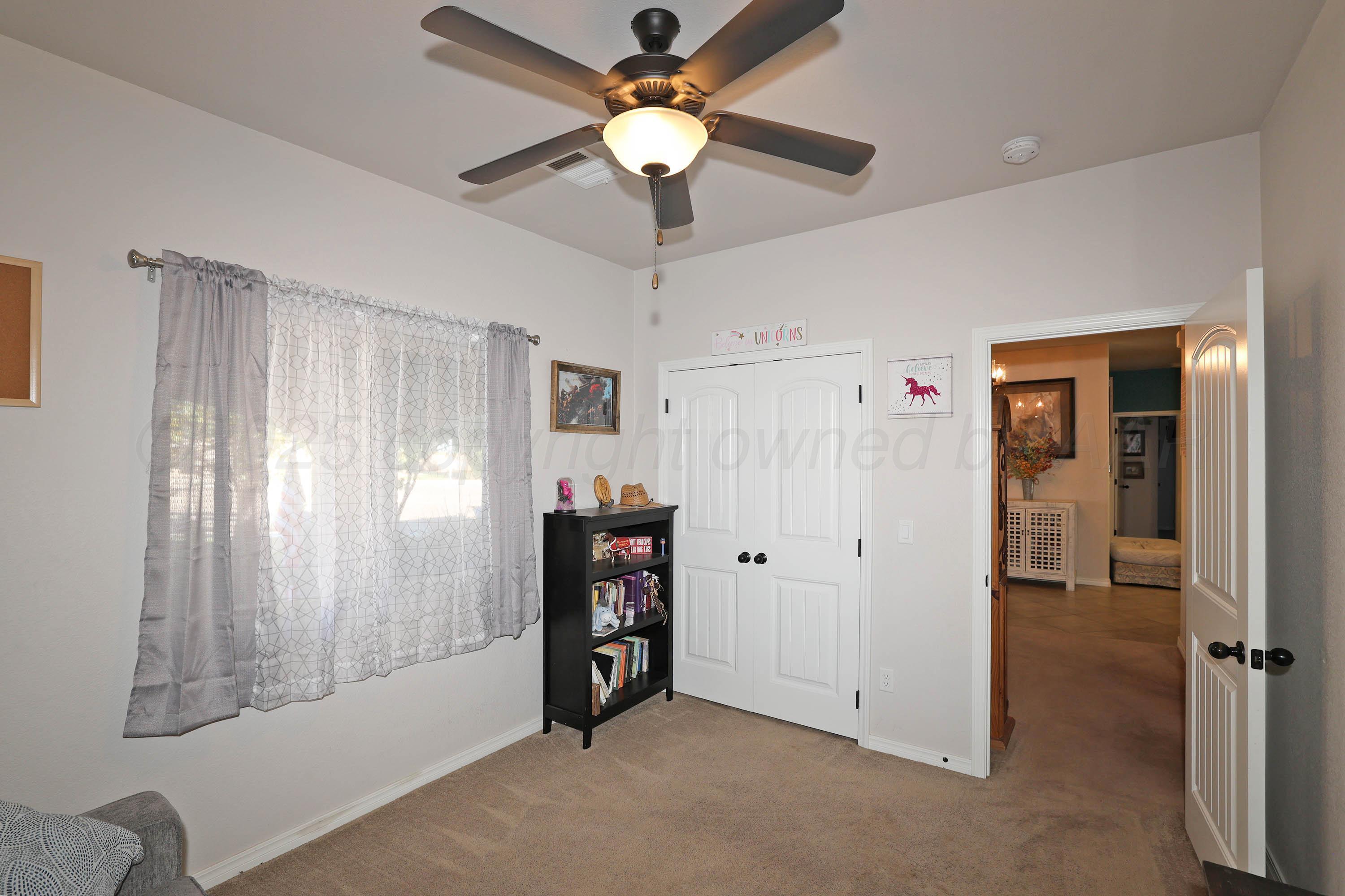 1003 Cabernet Way Amarillo, TX 79124 - Photo 24 of 36 a view of an empty room with a window