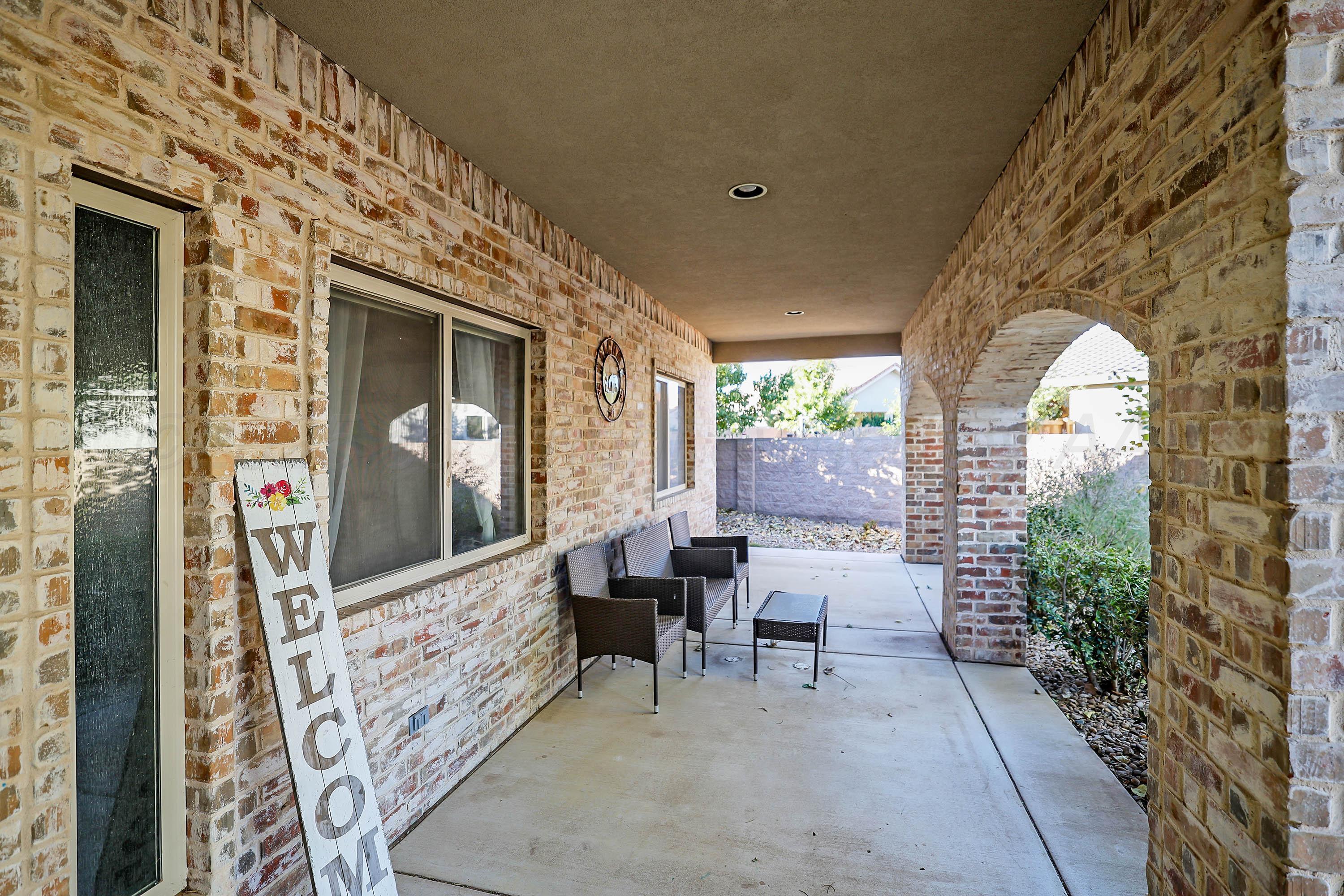 1003 Cabernet Way Amarillo, TX 79124 - Photo 3 of 36 a living room with furniture and a flat screen tv