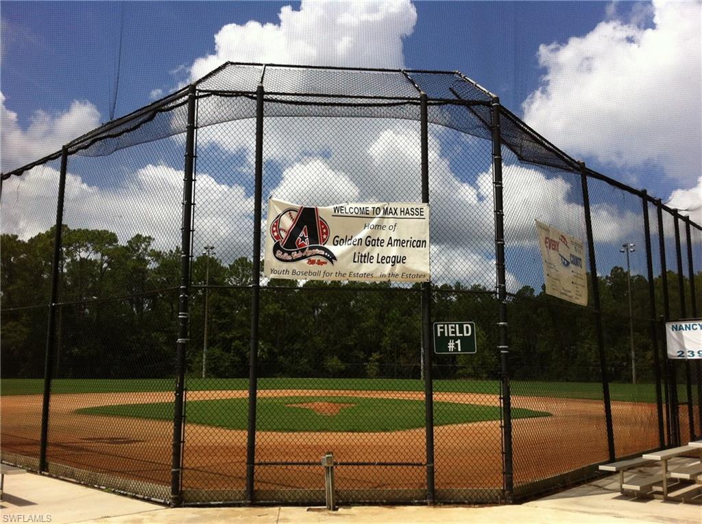 381 22nd Street Northeast Naples, FL 34120 - Photo 15 of 17 a bathroom with a glass shower door