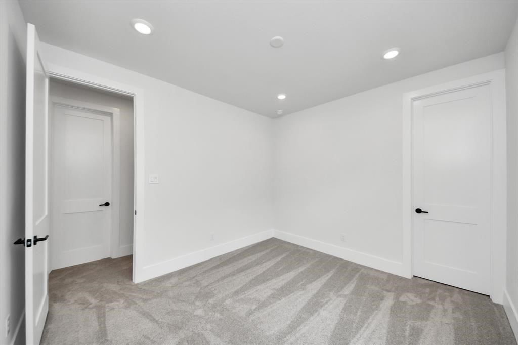 405 Forest Reserve Place Houston, TX 77079 - Photo 31 of 38 This photo displays the other spacious secondary bedroom with a walk in coset